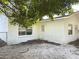 Exterior view of home featuring partial backyard at 21111 Se Honeysuckle St, Dunnellon, FL 34431