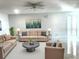 Bright living room features neutral walls and recessed lighting, creating a welcoming atmosphere at 21111 Se Honeysuckle St, Dunnellon, FL 34431