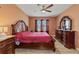 Spacious bedroom with large bed, dresser, and window at 451 Hickory Course Loop, Ocala, FL 34472