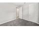 Spacious bedroom with grey carpet and neutral walls at 5779 Sw 87Th Court Rd, Ocala, FL 34481