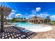 Relaxing pool area with pergola and clubhouse at 6365 Sw 88Th Loop, Ocala, FL 34476