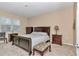 Large main bedroom with carpeted floor and a window with blinds at 6365 Sw 88Th Loop, Ocala, FL 34476