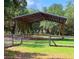 Barn on grassy horse property with fencing at 11064 Ne 212Th Ln, Fort Mc Coy, FL 32134
