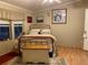 Inviting bedroom with a cozy bed, wooden chest, and natural light from the windows at 11064 Ne 212Th Ln, Fort Mc Coy, FL 32134