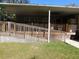 Exterior deck features a handicap ramp at 11064 Ne 212Th Ln, Fort Mc Coy, FL 32134