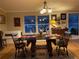 Elegant dining room features a unique horse-themed table and decorative accents at 11064 Ne 212Th Ln, Fort Mc Coy, FL 32134