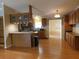 Open kitchen area with a breakfast bar and plenty of cabinet space at 11064 Ne 212Th Ln, Fort Mc Coy, FL 32134