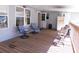 Relaxing porch with chairs, perfect for enjoying the outdoors at this lovely home at 11064 Ne 212Th Ln, Fort Mc Coy, FL 32134