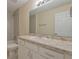 Clean bathroom with granite countertop and updated vanity at 13351 Sw 83Rd Cir, Ocala, FL 34473