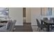 Bright dining area with dark wood table and gray chairs at 13351 Sw 83Rd Cir, Ocala, FL 34473