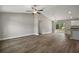 Open-concept living room featuring hardwood floors, recessed lighting, and access to the kitchen at 174 Pine Crse, Ocala, FL 34472