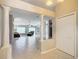 Open entryway with view into living room at 2117 Sansores St, The Villages, FL 32159