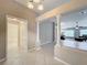 View of entryway, hallway, and living room at 2117 Sansores St, The Villages, FL 32159