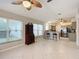 Open kitchen with stainless steel appliances and granite countertops at 2117 Sansores St, The Villages, FL 32159