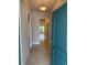 Bright entryway featuring tile flooring, neutral walls, and a view into the home's living spaces at 2134 Nw 23Rd Loop, Ocala, FL 34475