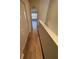 Upper level hallway with wood flooring and access to bedrooms at 4108 Sw 54Th Cir, Ocala, FL 34474