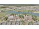 Aerial view of community amenities including pool, clubhouse, and golf course at 8729 Sw 61St Loop, Ocala, FL 34481