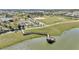 Community features a lake with a gazebo and walking paths at 8729 Sw 61St Loop, Ocala, FL 34481