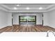 Bright living room with hardwood floors and sliding glass doors at 8729 Sw 61St Loop, Ocala, FL 34481