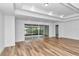 Bright and spacious living room with sliding glass doors leading to a patio at 8729 Sw 61St Loop, Ocala, FL 34481