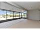 Spacious screened porch with concrete flooring and sliding doors at 8729 Sw 61St Loop, Ocala, FL 34481
