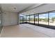 Spacious screened porch with concrete flooring and sliding doors at 8729 Sw 61St Loop, Ocala, FL 34481