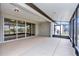 Spacious screened porch with concrete flooring and sliding doors at 8729 Sw 61St Loop, Ocala, FL 34481