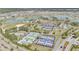 Community tennis courts and surrounding landscape at 8729 Sw 61St Loop, Ocala, FL 34481