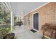 Covered porch with swing provides a relaxing outdoor space at 10249 Nw 21St St, Ocala, FL 34482