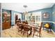 Bright dining room with hardwood floors and a chandelier at 10249 Nw 21St St, Ocala, FL 34482