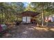 Metal-roofed equipment shed with enclosed trailer at 10249 Nw 21St St, Ocala, FL 34482