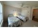 Bedroom with two beds, a ceiling fan, and closet space at 11147 Sw 68Th Ct, Ocala, FL 34476