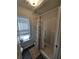 Bathroom with shower stall and patterned shower curtain at 12495 Se 102Nd Ave, Belleview, FL 34420