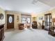 Living room with hardwood floors and comfortable seating at 2360 Hopespring Loop, The Villages, FL 32162