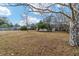 Large backyard with mature trees and plenty of open space at 3720 Se 24Th St, Ocala, FL 34471