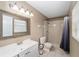 Clean bathroom with shower/tub combo, vanity, and updated fixtures at 3720 Se 24Th St, Ocala, FL 34471