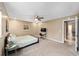 Bright bedroom featuring a king-size bed and a workspace at 3720 Se 24Th St, Ocala, FL 34471