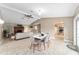 Casual dining area with a view into the living room and kitchen at 3720 Se 24Th St, Ocala, FL 34471