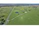 Aerial view of property showcasing home and large pasture at 4027 N C 470, Lake Panasoffkee, FL 33538