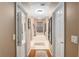 Bathroom hallway with double sinks and a large soaking tub at 4027 N C 470, Lake Panasoffkee, FL 33538