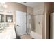 Main bathroom with shower/tub combo and double vanity at 4027 N C 470, Lake Panasoffkee, FL 33538