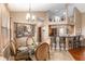 Elegant dining area with glass-top table and ornate chairs at 4027 N C 470, Lake Panasoffkee, FL 33538