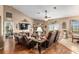 Relaxing living room featuring leather recliners and a stone fireplace at 4027 N C 470, Lake Panasoffkee, FL 33538