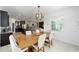 Open-concept design seamlessly blends dining, kitchen, and living spaces, ideal for gatherings and entertainment at 4812 Se 37Th St, Ocala, FL 34480