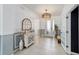 Elegant foyer with neutral tones, decorative lighting, and a stylish console table with decor at 4812 Se 37Th St, Ocala, FL 34480