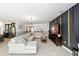 Bright and airy living space blending modern decor and inviting sectional with an adjacent open kitchen at 4812 Se 37Th St, Ocala, FL 34480