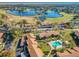 Aerial view showing community pool and surrounding buildings at 506 Fairways Cir # B, Ocala, FL 34472