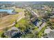 Aerial view of condo community near a lake and golf course at 506 Fairways Cir # B, Ocala, FL 34472