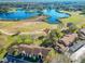 Aerial view of condo community by a lake and golf course at 506 Fairways Cir # B, Ocala, FL 34472