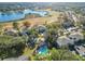 Aerial view of community with pool and golf course views at 506 Fairways Cir # B, Ocala, FL 34472